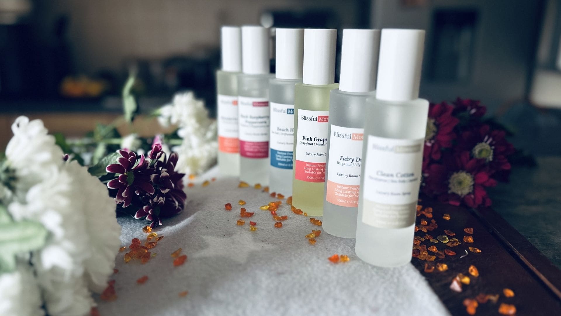 What is a room spray and how does it work? 6 luxury frosted glass room sprays stood next to each other