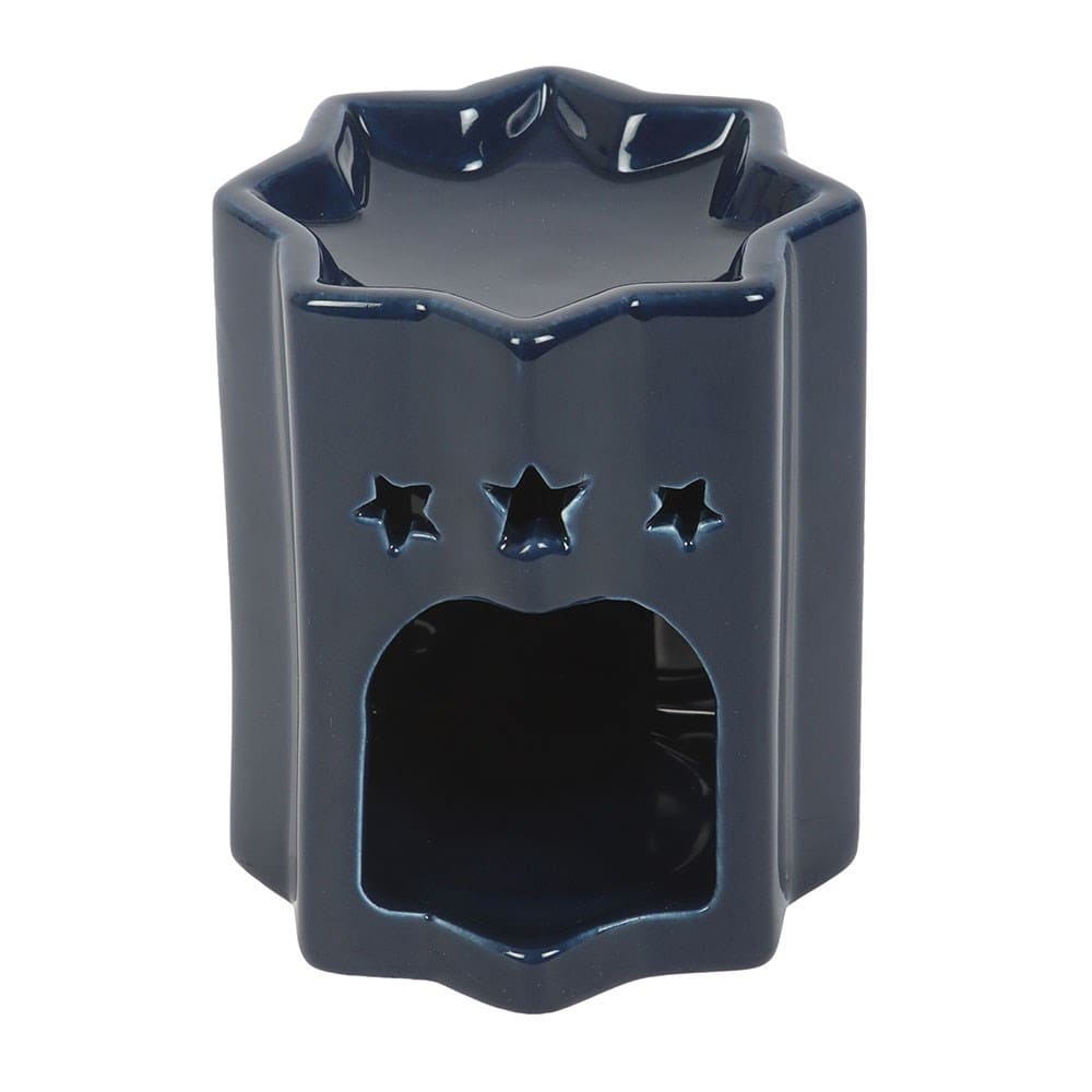 Navy blue ceramic wax melt burner with star designs on a white background