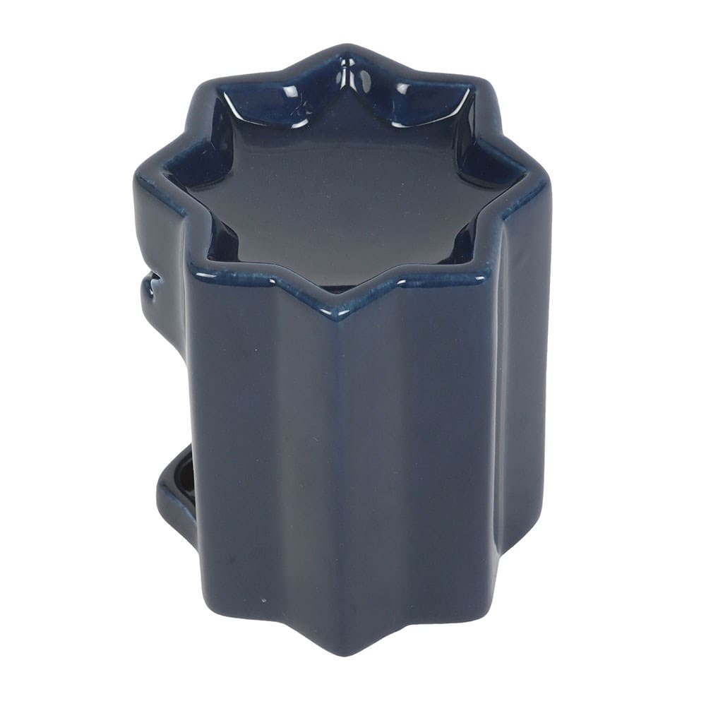 Blue ceramic wax melt burner on a white background