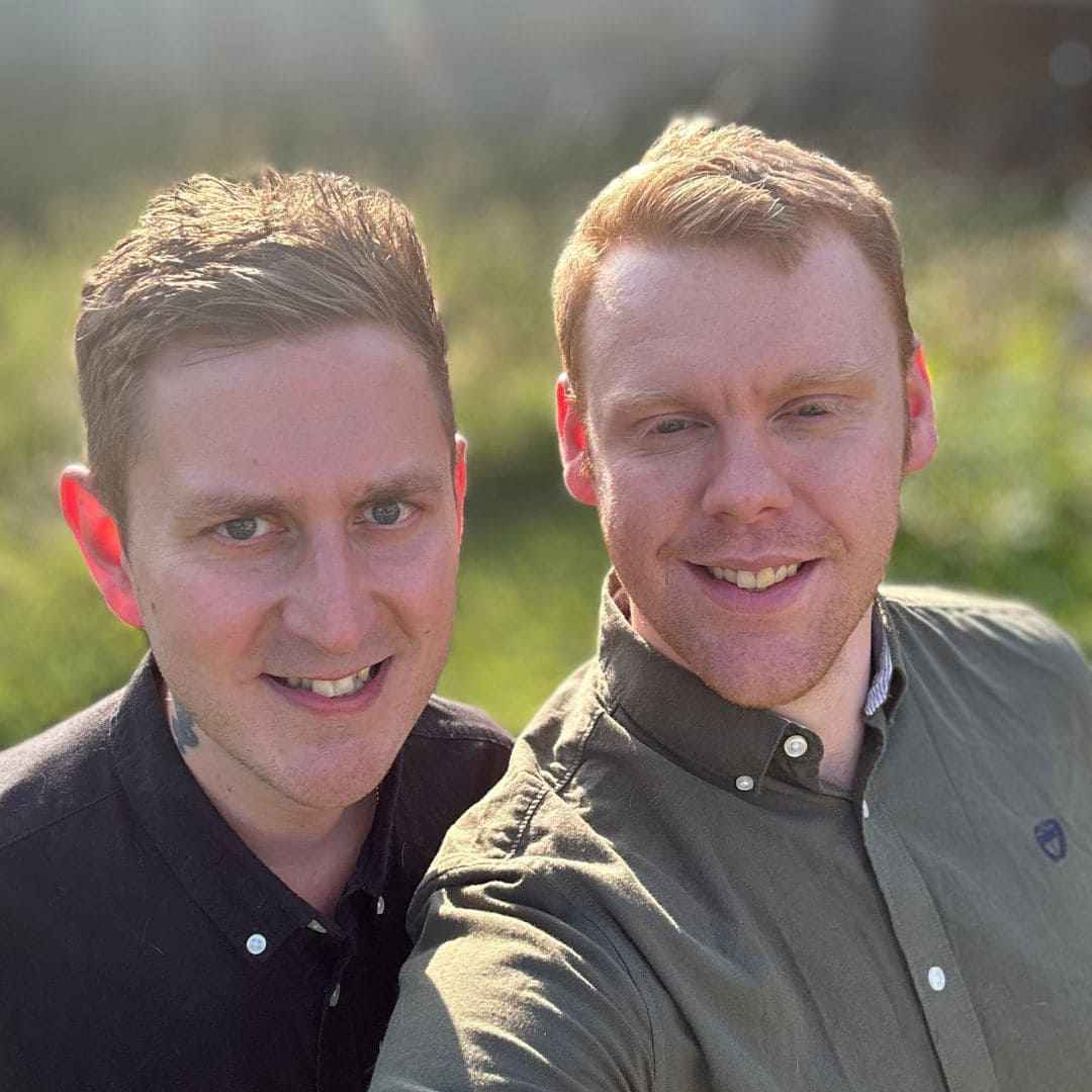 Blissful moments - Meet the makers Tom & Hasip: Two men posing for a selfie outdoors with a blurred natural background